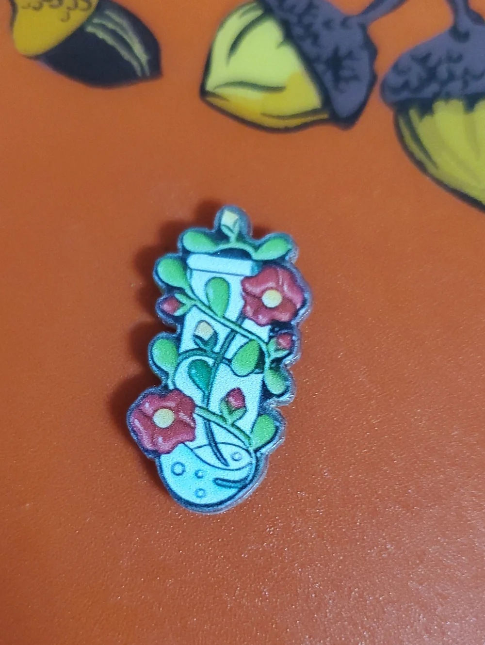 Floral Potion Acrylic Pin in Red, Green, White